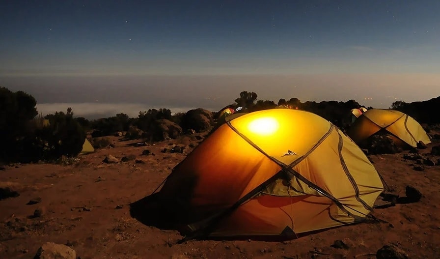 tents in a campground at night